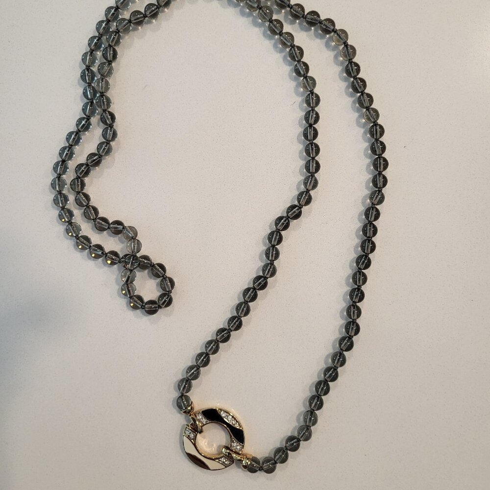 Lovely Stranded Necklace adorned with Crystal inlayed Pendant